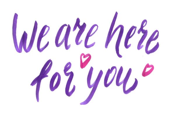 Hand-lettered note in purple marker: We are here for you, with two pink hearts